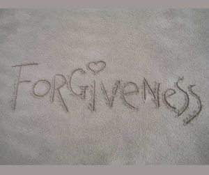 Forgiveness: Forgiveness is written in the sand.