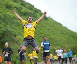 Runner on a track heading toward the finish line, symbolizing perseverance in faith.